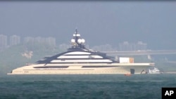 In this image taken from a video footage run by TVB, the megayacht Nord, worth more than $500 million, is seen off Hong Kong outside Victoria Harbor on Oct. 7, 2022. 