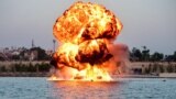 A dummy target is exploded by use of mines by Indian Navy&#39;s divers, as a part of rehearsals for the upcoming defense equipment exhibition - Defence Expo 2022 - at the Sabarmati Riverfront in Ahmedabad.
