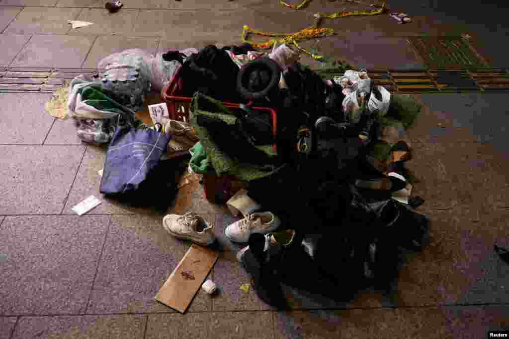 Belongings of victims are seen at the scene where many people died and were injured in a stampede during a Halloween festival in Seoul, South Korea, Oct. 30, 2022. 