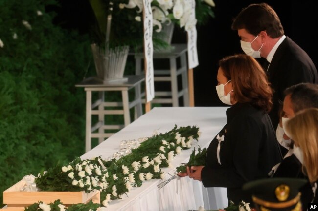 U.S. Vice President Kamala Harris lays flowers during the state funeral for former Prime Minister Shinzo Abe, Sept. 27, 2022, in Tokyo. Abe was assassinated in July.