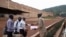 Rwandan reporters with the YouTube channel Iwacu TV, Jean Baptiste Nshimiyimana, Niyonsenga Schadrack, and Jean Damascene Mutuyimana are cleared outside the Mageragere Prison near Kigali, Rwanda October 5, 2022.