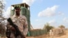 FILE - An African Union soldier is seen deployed to Bulobarde and Jalalaqsi, Somalia.