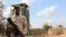 FILE - An African Union soldier is seen deployed to Bulobarde and Jalalaqsi, Somalia.