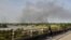FILE: Smoke billows in al-Roseires in Sudan's southern Blue Nile state on September 2, 2022 amid renewed ethnic clashes despite a ceasefire agreement between rival groups following deadly violence weeks ago. 
