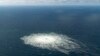 FILE - A large disturbance in the sea can be observed off the coast of the Danish island of Bornholm, Sept. 27, 2022, following a series of unusual leaks on two natural gas pipelines running from Russia under the Baltic Sea to Germany. 