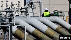 FILE - Pipes at the landfall facilities of the Nord Stream 1 gas pipeline are pictured in Lubmin, Germany, March 8, 2022.