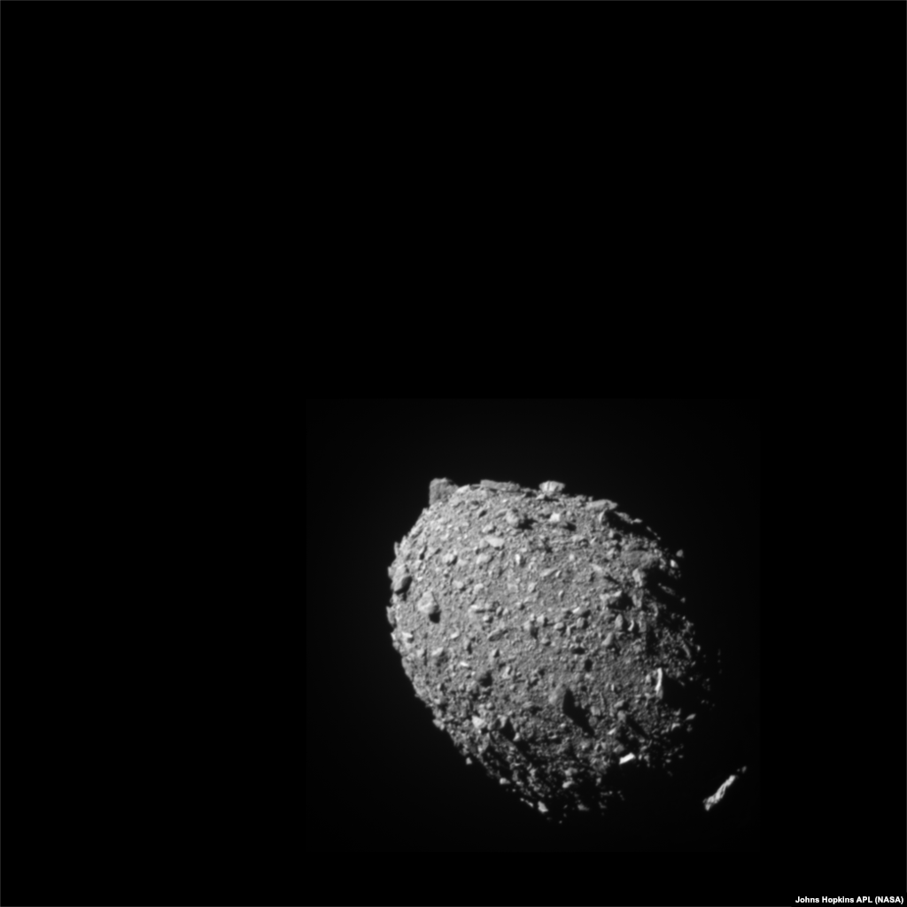 Asteroid moonlet Dimorphos, as seen by NASA&#39;s DART spacecraft 11 just seconds before impact, Sept. 26, 2022.