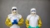 FILE - Staff from South Sudan's Health Ministry pose with protective suits during a drill for Ebola preparedness conducted by the World Health Organization (WHO) with ALIMA (The Alliance for International Medical Action) and International Medical Corps in Juba, August 14, 2019.