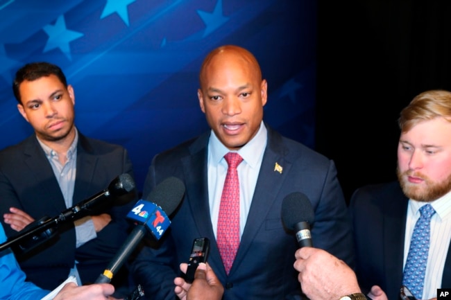 FILE - Gubernatorial candidate Democrat Wes Moore talks to reporters after a debate with his opponent Republican Dan Cox, Wednesday, Oct. 12, 2022 in Owings Mills, Md. (AP Photo/Brian Witte)