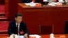 中共領導人習近平和前中共領導人胡錦濤曾經坐過的空椅子。 （2022年10月22日）
