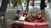 Residents in an Orlando, Fla., neighborhood are rescued due to floodwaters from Hurricane Ian, Sept. 29, 2022.