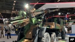 FILE - A French artillery piece Caesar is photographed at the Eurosatory land and airland defense and security trade fair on June 13, 2022 in Villepinte, north of Paris. 