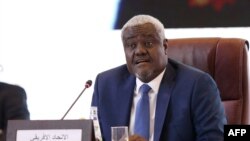 FILE - African Union (AU) Commission Chairperson Moussa Faki Mahamat attends a signing ceremony in Doha on Aug. 8, 2022 between Chad's military ruler and more than 40 opposition groups to launch national peace talks.