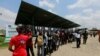 A volunteer guiding people who are registering to vote at a INEC voter registration exercise held in Abuja, June 23,2022