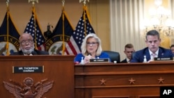 FILE - Vice Chair Rep. Liz Cheney offers a motion to subpoena former President Donald Trump as Chairman Rep. Bennie Thompson, left, and Rep. Adam Kinzinger listen during the House select committee investigating the Jan. 6 attack on the U.S. Capitol, Oct. 13, 2022.