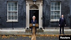 British Prime Minister Liz Truss announces her resignation outside the official Number 10 Downing Street residence, London, Britain October 20, 2022. 