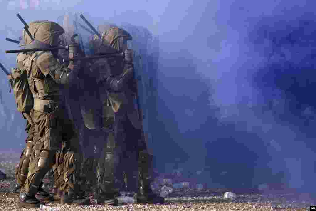 EUFOR (European Force) troops clash with protesters during an exercise &quot;EUFOR Quick Response 2022&quot; in Butmir base, in Sarajevo, Bosnia.