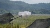 FILE - A U.S .155mm Howitzer fires a round during annual combat drills between the Philippine Marine Corps and U.S. Marine Corps in the northern Philippines, Oct. 13, 2022. Filipino and U.S. troops will kick off joint military exercises in the Philippines on Monday.