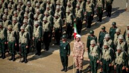 FILE - In this photo from the Islamic Revolutionary Guard Corps' Ground Force on Oct. 17, 2022, troops stand while attending a maneuver in northwestern Iran.