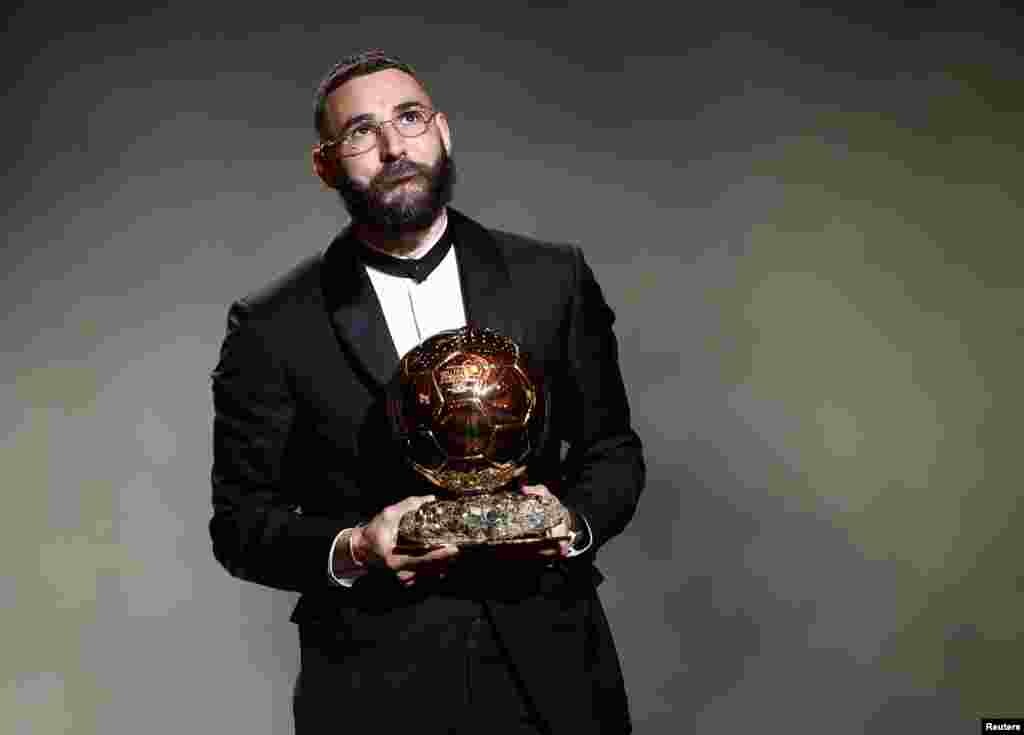 Real Madrid's French forward Karim Benzema react after winning the Ballon d'Or award during the 2022 Ballon d'Or France Football award ceremony at the Theatre du Chatelet in Paris, France, Oct.17, 2022.