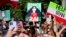 FILE - Iranian Americans participate in a rally in downtown Los Angeles, Oct. 1, 2022, in solidarity with women in Iran.