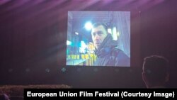 People watching a movie at the European Union Film Festival held in Harare