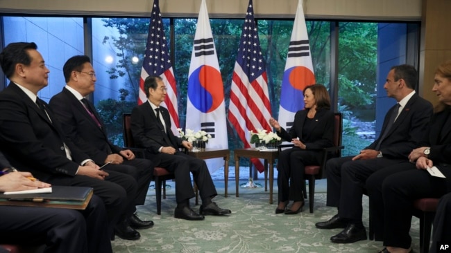 U.S. Vice President Kamala Harris, center right, holds a bilateral meeting with South Korea's Prime Minister Han Duck-soo, center, left, in Tokyo, Sept. 27, 2022.