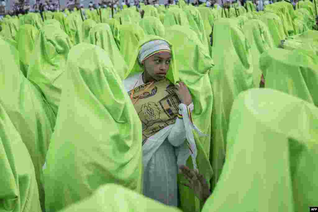 An Orthodox choir parade during the celebrations ahead of the Ethiopian Orthodox holiday of Meskel, in Addis Ababa, Ethiopia, Sept. 26, 2022.