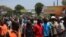 FILE - Protesters march against the rising cost of living and poor governance, in Blantyre, Malawi, Oct. 27, 2022. 
