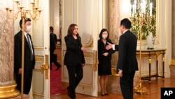 U.S. Vice President Kamala Harris, center left, is welcomed by Japan's Prime Minister Fumio Kishida before their meeting at the Akasaka Palace state guest house in Tokyo, Sept. 26, 2022.