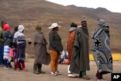 People line up to cast their votes at a polling station in Thaba-Tseka District, 82km east of Maseru, Lesotho, Oct. 7, 2022.