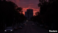 A view of the city center without electricity after critical civil infrastructure was hit by a Russian missile attacks, in Kamianske, Dnipropetrovsk region, Ukraine, Oct. 11, 2022.