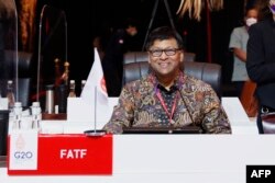 FILE - Financial Action Task Force (FATF) President Raja Kumar attends a meeting in Nusa Dua, on Indonesia resort island of Bali, July 16, 2022.