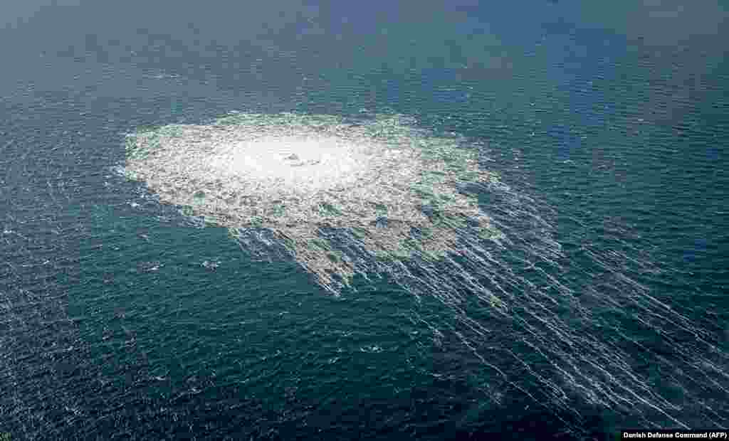 The gas leak at the Nord Stream 2 gas pipeline is seen from the Danish Defence&#39;s F-16 rejection response off the Danish Baltic island of Bornholm, south of Dueodde, Denmark.&nbsp;The two Nord Stream gas pipelines linking Russia and Europe have been hit by unexplained leaks, Scandinavian authorities said, raising suspicions of sabotage.