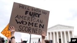 People protest at the Supreme Court following the high court's decision to overturn Roe v. Wade in Washington, June 24, 2022.
