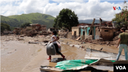 Labores de recuperación y rescate tras el deslave en Las Tejerías, en Venezuela.