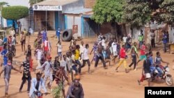 People walk as they protest in Moundou, Chad, Oct. 20, 2022, in this photo obtained from social media.