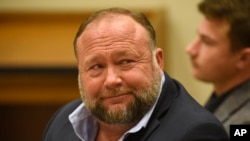 FILE - Infowars founder Alex Jones appears in court to testify during the Sandy Hook defamation damages trial at Connecticut Superior Court in Waterbury, Conn., Sept. 22, 2022.