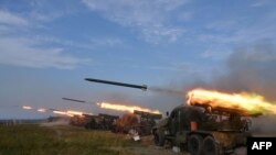 The North Korean People's Army front-line long-range artillery division and air force squadron during a fire attack training exercise. (Oct. 6, 2022) 