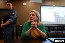 FILE - Former Russian state TV employee Marina Ovsyannikova, attends a court hearing in Moscow, Russia, July 28, 2022.
