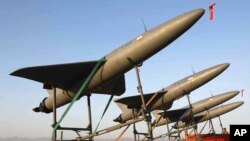 FILE - In this photo released by the Iranian army on Aug. 24, 2022, drones are prepared for launch during a drone drill in Iran.