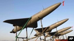 FILE - In this photo released by the Iranian army on Aug. 24, 2022, drones are prepared for launch during a drone drill in Iran.