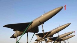FILE - In this photo released by the Iranian army on Aug. 24, 2022, drones are prepared for launch during a drone drill in Iran.