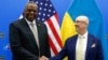 U.S. Secretary of Defense Lloyd Austin with Ukrainian Minister of Defense Oleksii Reznikov ahead of a meeting of the Ukraine Defense contact group in Brussels, Belgium, October 12, 2022. (Stephanie Lecoco/via Reuters)