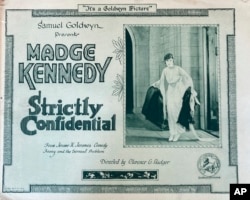 A movie theater lobby card promotes the 1919 silent film "Strictly Confidential." (Photo Courtesy Dwight Cleveland via AP)