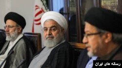 رضا عاملی (راست) از زمان دولت حسن روحانی در سمت‌های حکومتی وارد شد.