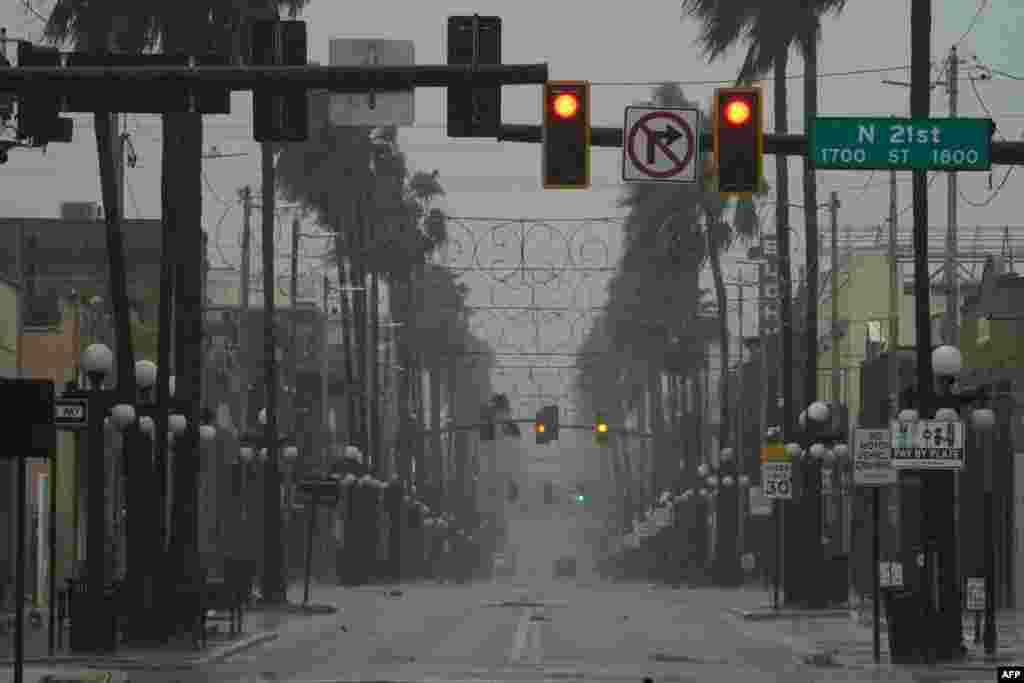 Wind and rain pick up in the Ybor City neighborhood ahead of Hurricane Ian making landfall on Sept. 28, 2022 in Tampa, Florida. 
