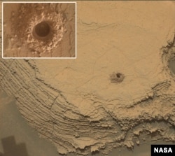 Curiosity used its Mast Camera, or Mastcam, to capture this image of its 36th successful drill hole on Mount Sharp, at a rock called “Canaima.” The rovers Mars Hand Lens Imager took the inset image. The pulverized rock sample was acquired on Oct. 3, 2022. (Credits: NASA/JPL-Caltech/MSSS)