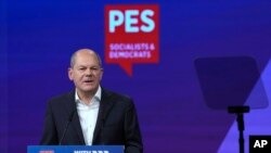 German Chancellor Olaf Scholz delivers a speech during a congress of the Party of European Socialists (PES) in Berlin, Germany, Oct. 15, 2022. 