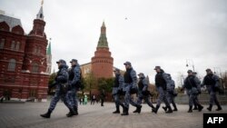 Servicemen of the Russian National Guard (Rosgvardia) secure Manezhnaya Square just outside the Kremlin in Moscow on Oct. 20, 2022.